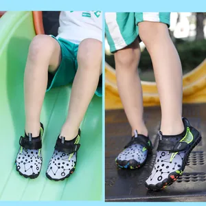 Detailed macro view of children's quick-dry water shoes with polka dot pattern and Velcro strap