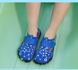Detailed view of blue children's water shoes for beach, swimming and snorkeling activities