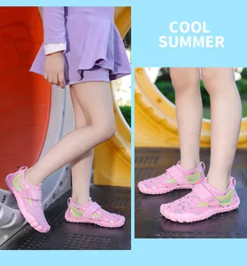 Detail view of pink children's water shoes with anti-slip soles for beach and swimming