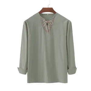 Detailed view of mens cotton linen casual shirt with lace-up neckline and embroidery