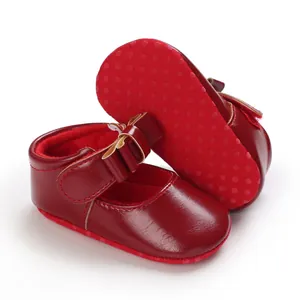 Detailed view of red baby girl princess walker shoes with soft anti-slip dotted soles