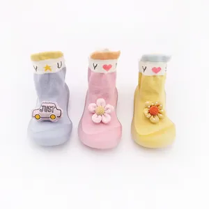 Three pairs of cute cartoon baby walking shoes with soft rubber soles