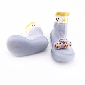 Cute baby cartoon sock shoes with soft non-slip rubber sole and pink car patch detail
