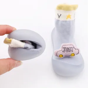Flexible rubber sole and car detail on soft-soled baby cartoon walking sock shoes