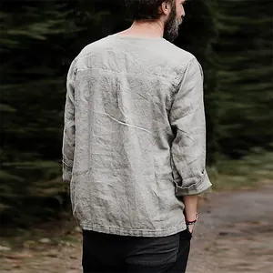 Back view of a loose men's linen cotton shirt in light grey with natural texture details