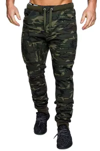 Detailed view of men's camouflage joggers with moto-style ribbed knee design
