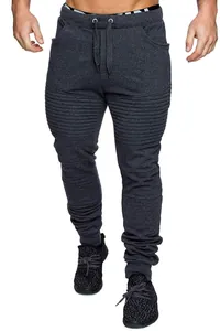 Detail view of charcoal men's joggers with moto ribbed thigh design and drawstring waist.