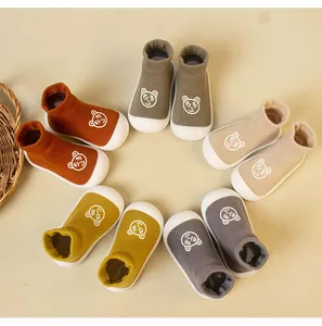 Various colors of cartoon bear knit baby sock shoes with soft non-slip soles