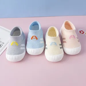 Detail view showing four colors of soft-sole knitted flyknit walker shoes for infants