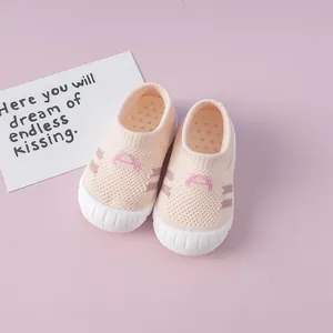 Detailed view of pink breathable fly-knit baby walking shoes with soft sole