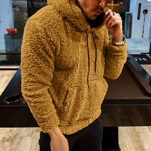 Detailed texture of men's camel teddy fleece drawstring hoodie with kangaroo pocket
