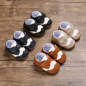 Various colors of non-slip baby walker shoes with brogue details and hook-and-loop straps.