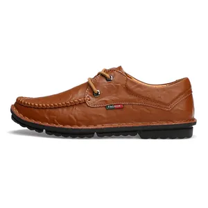 Classic men's brown handmade casual leather shoes featuring decorative stitching and laces