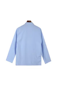 Detailed back view of minimalist light blue cotton linen jacket for men in loose fit style