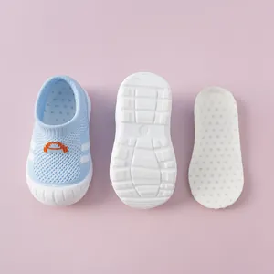 Detailed view of blue flyknit baby walking shoes with white soft sole and insole