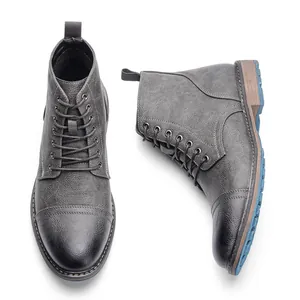Botas Martin grises de alta calidad para hombre con cordones y suela de goma azul duradera.