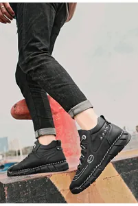 Detailed side view of black high-top men's leather Martin boots featuring 5 SPORT logo.