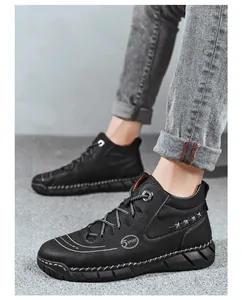 Premium black men's high-top leather casual shoes featuring durable laces and textured finish