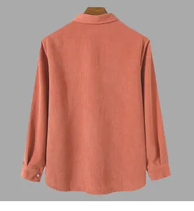 Back view of a men's casual orange corduroy shirt featuring fine ribbed texture details