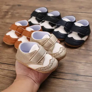 Close-up detail of soft-soled baby walking shoes in multiple colors for infants