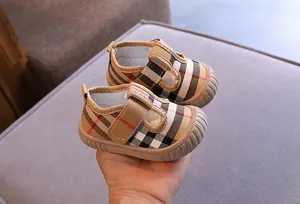 Toddler canvas walking shoes with classic plaid pattern and soft anti-slip soles.