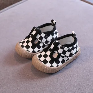 Stylish infant black and white checkerboard canvas walking shoes with soft anti-slip soles