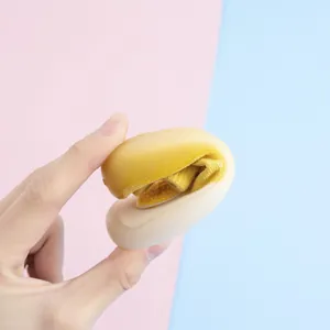 Close-up of highly flexible yellow baby sock shoe with soft anti-slip rubber sole detail