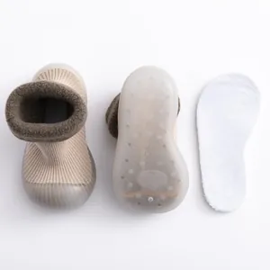 Detailed view of warm sherpa-lined baby walking shoes with non-slip soft soles and insoles