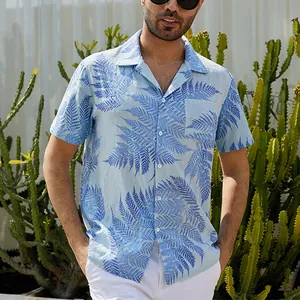 Men's casual light blue short sleeve shirt with navy fern leaf print detail