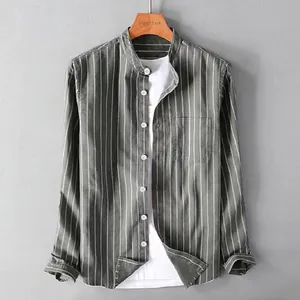 Close-up of men's casual striped cotton linen shirt with stand collar detail