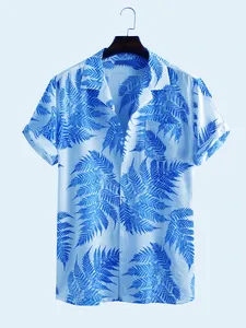 Close-up of men's summer casual shirt with blue fern leaf print on white background