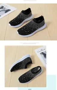 Detail der schwarzen Strass-Sneaker aus Fly-Knit mit bequemer flacher weißer Sohle