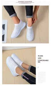 Detailansicht weißer Sneaker mit Strasssteinen und atmungsaktivem Mesh-Obermaterial