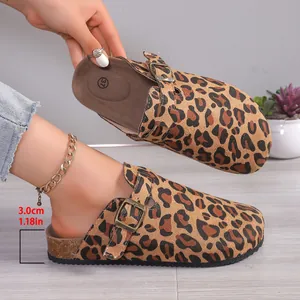 Detailed view of women's leopard print clogs highlighting the 3.0cm comfortable heel height