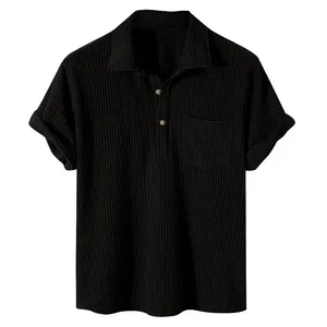 Men's waffle knit short sleeve polo shirt with lapel and chest pocket in black.