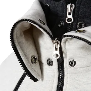 Close-up of men's thick hooded jacket collar with metal zippers and snap buttons