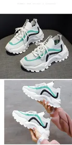 Detailed view of women's breathable knit chunky sneakers with mint green accents