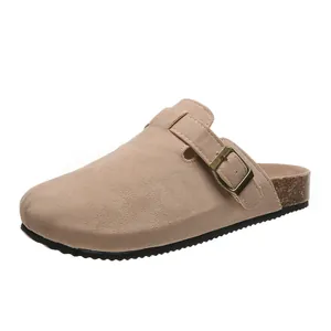 Classic tan suede closed-toe cork slippers with adjustable buckle strap for women