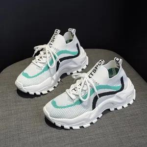 Breathable flyknit women's dad shoes with green and black patchwork and thick soles
