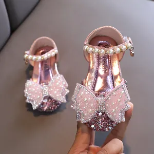 Chaussures de princesse roses pour filles décorées de perles et d'un nœud en strass