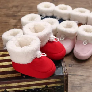 Bottines d'hiver rouges pour bébé avec doublure en polaire blanche et cordon de serrage