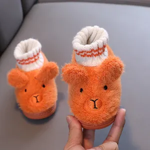 Orangefarbene Winter-Plüschhausschuhe für Kinder mit warmen Strickbündchen am Knöchel