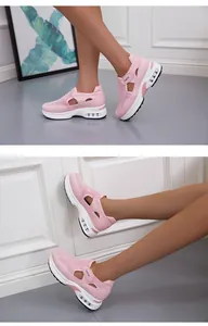 Dettaglio delle sneakers platform rosa traspiranti con rete traforata da donna