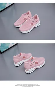 Vista laterale dettagliata di sneaker rosa in mesh traspirante con suola spessa