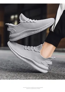 Casual grey men's breathable fly-woven sneakers featuring a lightweight EVA sole for comfort
