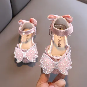 Elegante rosa Prinzessinnen-Sandalen für Mädchen mit großer Schleife und Strasssteinen