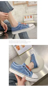 Mocassini platform in tela blu con fascia elastica a righe colorate e punta rotonda
