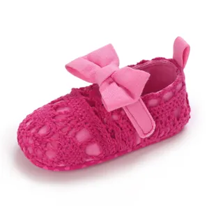 Pinke Häkel-Prinzessinenschuhe für Babys mit weicher Sohle und dekorativer Schleife