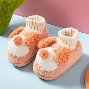 Adorable plush puppy slippers for toddlers featuring ribbed ankle collar and soft pink fur