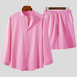 Pink men's linen set showing high detail of the long sleeve shirt and matching shorts